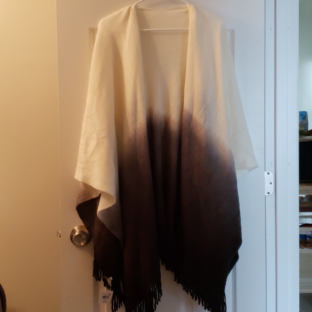 White and black poncho